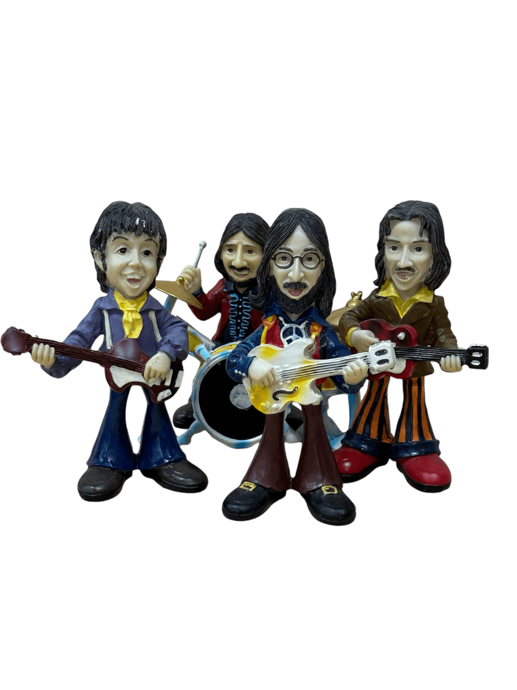 The Beatles figuras  resina colección
